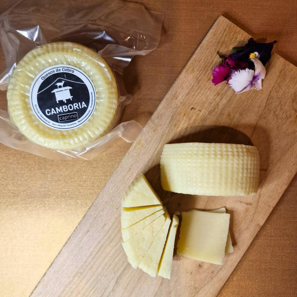 Wheel of pastured goat cheese (queso de cabra) Caprino by Camboria. Sustainable and regenerative dairy sourcing.