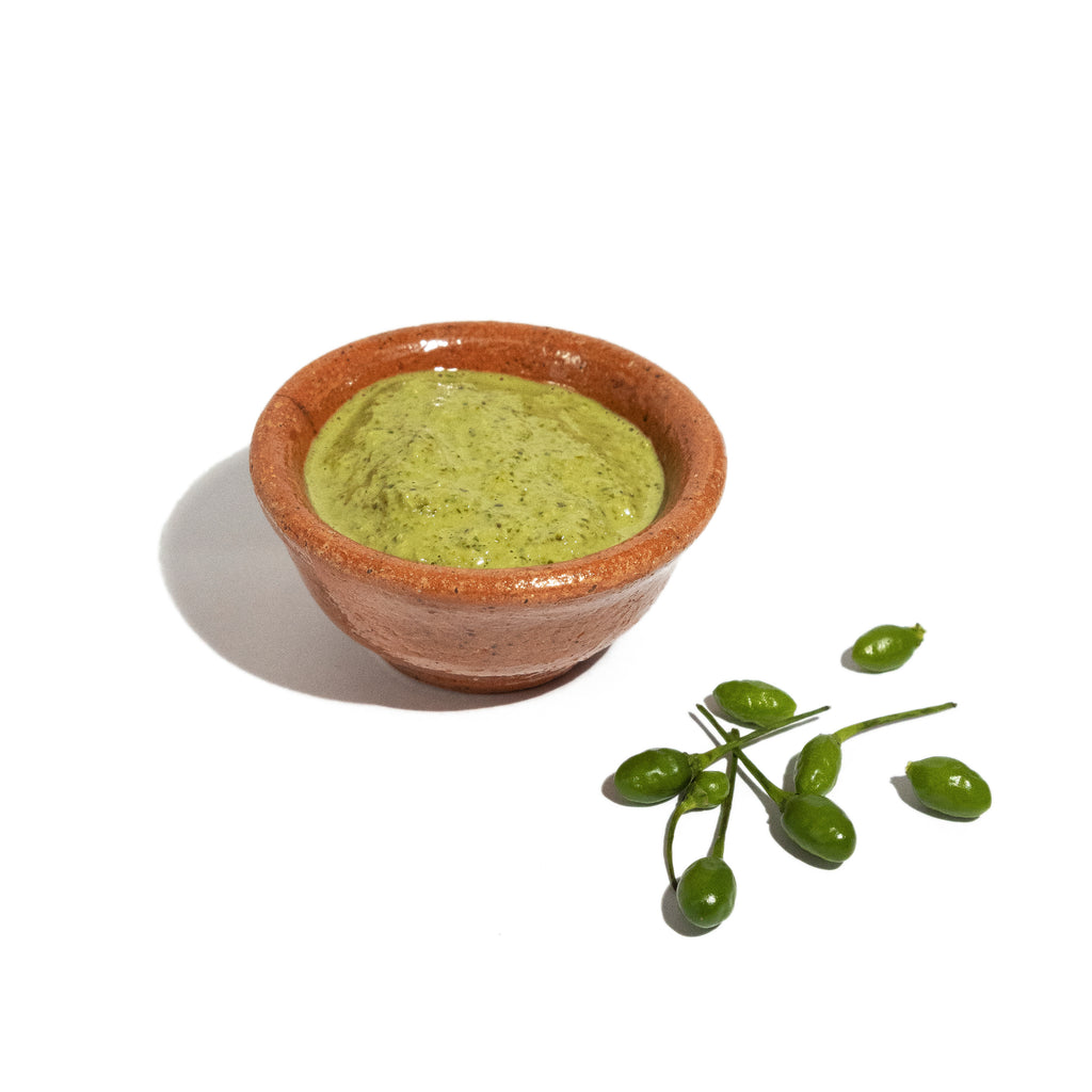 Organic artisanal hand made salsa de chile chiltepe. Authentic, clean ingredients for wellness.
