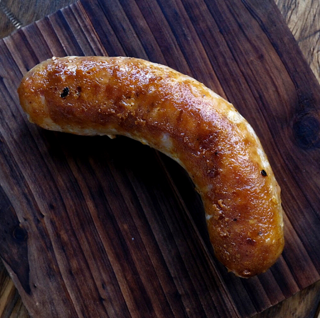 Artisanal Bratwurst pork sausage. Humane, sustainable, regenerative protein for wholesome wellness.