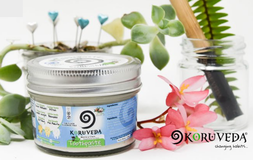 Sustainable chemical free toothpaste with mint and clove. Fluoride-free artisanal oral wellness.