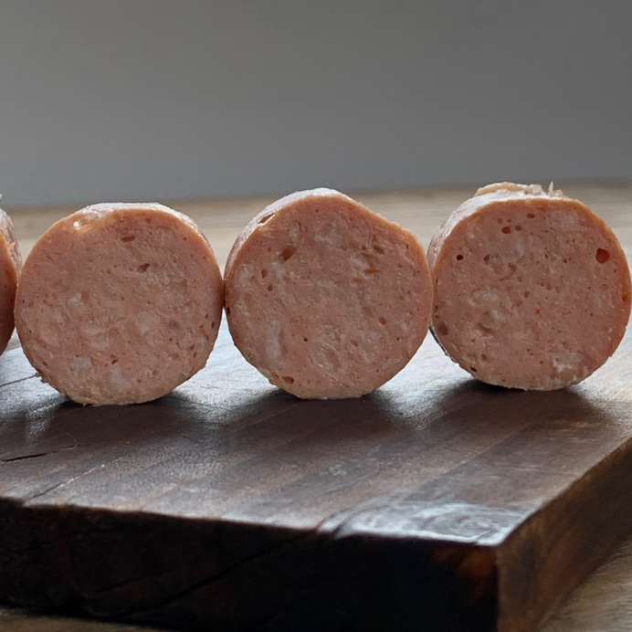 All natural sustainable Frankfurter sausage. Artisanal, humanely raised pork, smoked over organic oak.